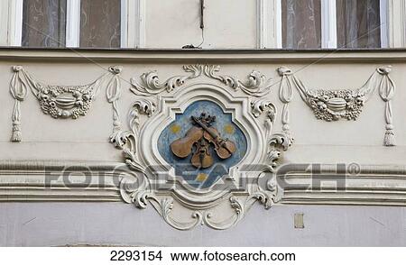 Picture - At the Three Little Fiddles House, Nerudova Street featuring a detail of violins from the craftsmen that use to live there, Prague, Czech Republic, Europe. Fotosearch