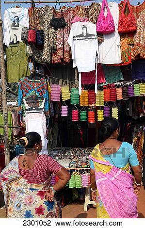 Stock Image - At world famous Anjuna Flea Market, held on Wednesdays on Anjuna Beach, Goa State, India, Asia.. Fotosearch