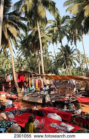 Stock Photography - At world famous Anjuna Flea Market, held on Wednesdays on Anjuna Beach, Goa State, India, Asia.. Fotosearch