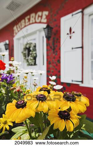 Stock Image - Auberge Du Mange Grenouille Inn And Garden, Bas-Saint-Laurent Region, Quebec. Fotosearch