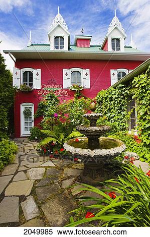 Stock Photography - Auberge Du Mange Grenouille Inn And Garden, Bas-Saint-Laurent Region, Quebec. Fotosearch