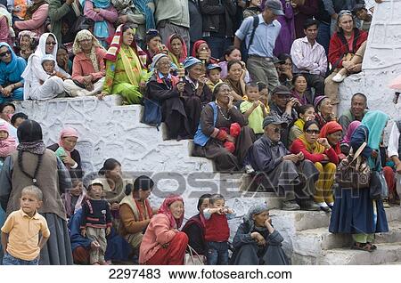 Stock Image - Audience at the opening parade of the Ladakh Festival. The Ladakh Festival is held every year in the first two weeks of September and celebrates local culture through dance and sport. Ladakh, Province of Jammu and Kashmir, India. Fotosearch