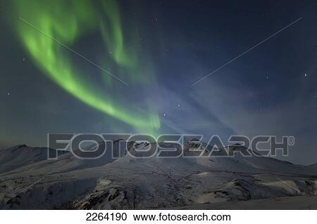 Aurora borealis dances over the klondike valley in tombstone territorial park; yukon canada View Large Photo Image Stock Image - Aurora borealis dances over the klondike valley in tombstone territorial park; yukon canada. Fotosearch