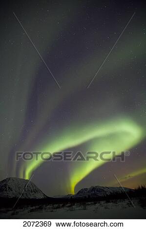 Stock Photo - Aurora Borealis (Northern Lights) In The Yukon, Canada. Fotosearch