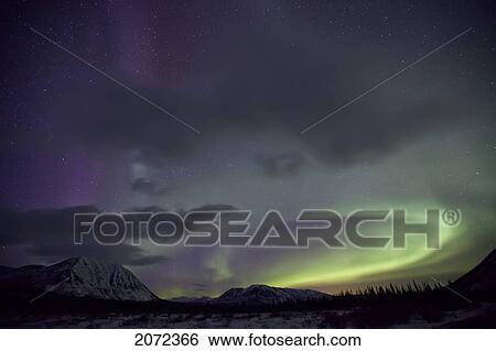 Stock Photograph - Aurora Borealis (Northern Lights) In The Yukon, Canada. Fotosearch