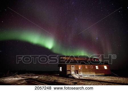 Aurora Borealis Or Northern Lights Over Lodge, Manitoba. View Large Photo Image Stock Photo - Aurora Borealis Or Northern Lights Over Lodge, Manitoba.. Fotosearch