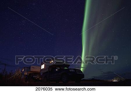 Aurora Borealis Over A Camper At Two Moose Lake By Dempster Highway; Yukon Canada View Large Photo Image Stock Photography - Aurora Borealis Over A Camper At Two Moose Lake By Dempster Highway; Yukon Canada. Fotosearch