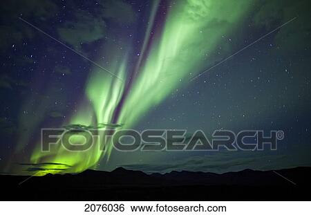 Aurora Borealis Over Mountains Along The Dempster Highway; Yukon Canada View Large Photo Image Stock Photograph - Aurora Borealis Over Mountains Along The Dempster Highway; Yukon Canada. Fotosearch