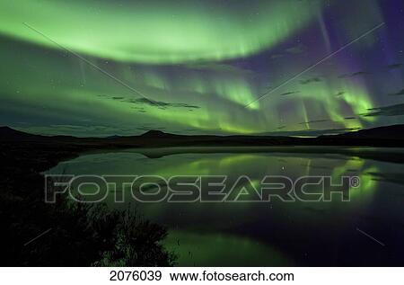 Aurora Borealis Over Two Moose Lake Dempster Highway; Yukon Canada View Large Photo Image Stock Photo - Aurora Borealis Over Two Moose Lake Dempster Highway; Yukon Canada. Fotosearch