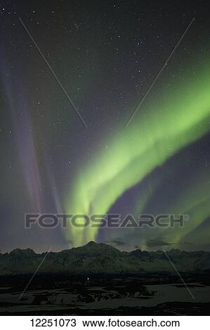 Aurora over Mt. McKinley as seen from Curry Ridge; Alaska, United States of America View Large Photo Image Stock Image - Aurora over Mt. McKinley as seen from Curry Ridge; Alaska, United States of America. Fotosearch