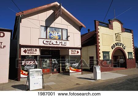 Stock Image - Australia, New South Wales, Bombala, Cafe And Shops Downtown, Blue Sky.. Fotosearch