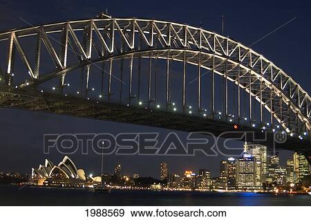 Stock Photo - Australia, New South Wales, Sydney, Harbour Bridge And Opera House At Night. Fotosearch