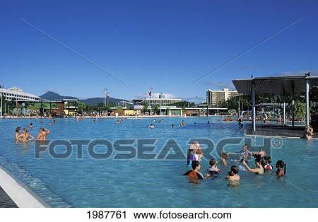 Stock Image - Australia, Queensland, Cairns, Lagoon At Marina, Locals In Large Pool.. Fotosearch