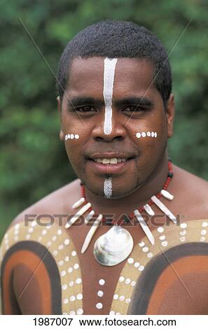 Australia, Queensland, Cairns, Portrait of aboriginal native man with paint on body; Tjapukai View Large Photo Image Stock Photo - Australia, Queensland, Cairns, Portrait of aboriginal native man with paint on body; Tjapukai. Fotosearch