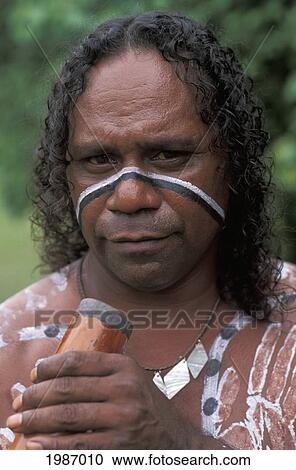 Australia, Queensland, Cairns, Aboriginal Native Man Holding Didgeridoo, Paint On Body. View Large Photo Image Stock Image - Australia, Queensland, Cairns, Aboriginal Native Man Holding Didgeridoo, Paint On Body.. Fotosearch