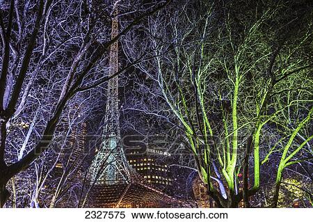 Stock Photography - Australia, Victoria, Bare tree in front of Melbourne Arts centre; Melbourne. Fotosearch