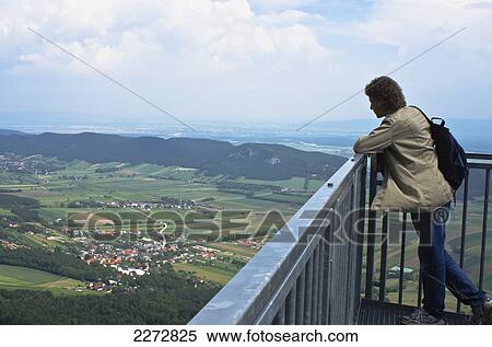 Austria, Man contemplating landscape in Hohe Wand Naturpark; Hohe Wand View Large Photo Image Stock Photography - Austria, Man contemplating landscape in Hohe Wand Naturpark; Hohe Wand. Fotosearch