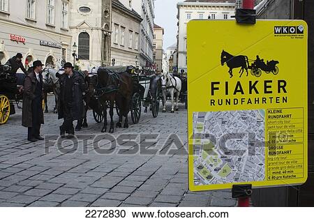 Stock Image - Austria, Vienna, Fiaker drivers waiting for customers; Stephans platz. Fotosearch