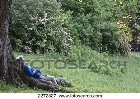 Austria, Woman resting in Turkenschanzpark; Vienna View Large Photo Image Stock Photo - Austria, Woman resting in Turkenschanzpark; Vienna. Fotosearch