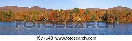 Stock Image - Autumn Panorama At Sallys Pond; West Bolton Quebec Canada. Fotosearch