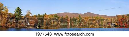 Stock Image - Autumn Panorama At Sallys Pond; West Bolton Quebec Canada. Fotosearch