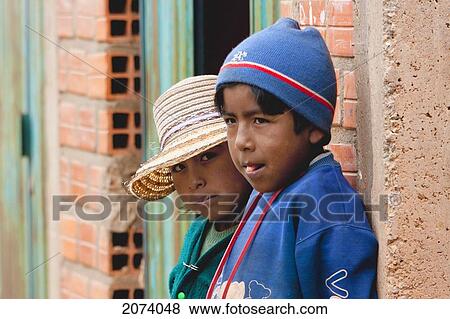 Aymara Girl And Boy, Pariti Island, Titicaca Lake, Bolivia View Large Photo Image Stock Photo - Aymara Girl And Boy, Pariti Island, Titicaca Lake, Bolivia. Fotosearch