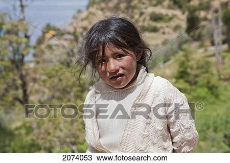 Stock Image - Aymara Girl, Isla Del Sol In Titicaca Lake, La Paz Department, Bolivia. Fotosearch