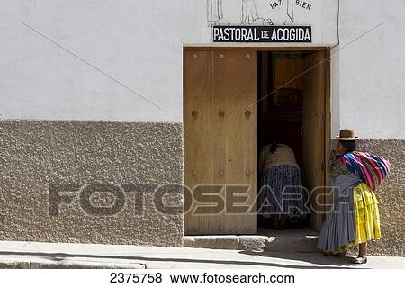 Aymara woman by the Basilica de Virgen de la Candelaria, Copacabana, La Paz Department, Bolivia View Large Photo Image Stock Photo - Aymara woman by the Basilica de Virgen de la Candelaria, Copacabana, La Paz Department, Bolivia. Fotosearch