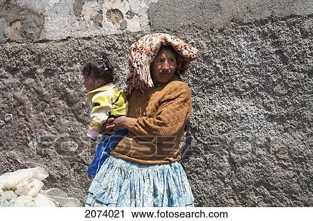 Aymara Woman Holding A Girl, La Paz, Bolivia View Large Photo Image Stock Image - Aymara Woman Holding A Girl, La Paz, Bolivia. Fotosearch