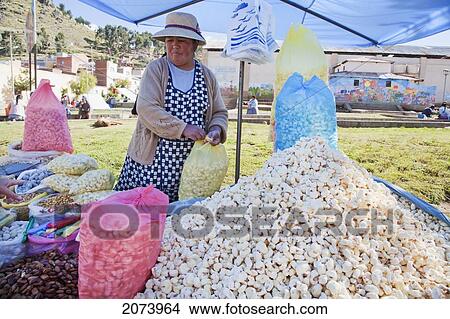 Aymara Woman Selling Pasankalla (Puffed Corn), Copacabana, La Paz Department, Bolivia View Large Photo Image Picture - Aymara Woman Selling Pasankalla (Puffed Corn), Copacabana, La Paz Department, Bolivia. Fotosearch
