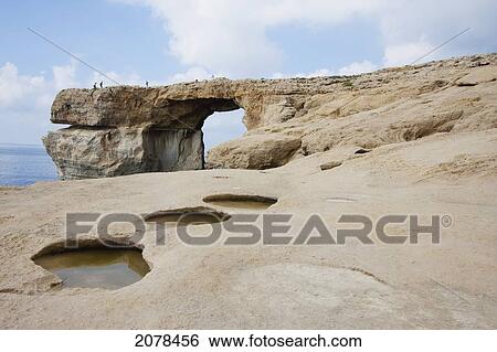 Stock Photograph - Azure Window, A Natural Rock Arch, Dwejra Bay, Gozo Island, Malta. Fotosearch