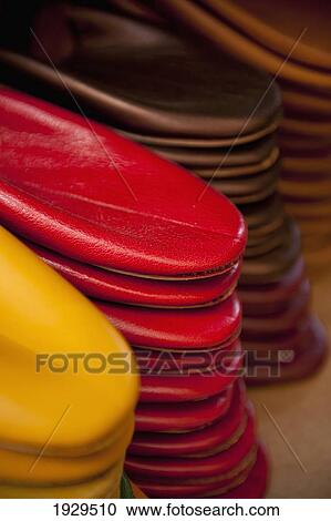Stock Image - Babouche slippers in various colours of leather; Fez, Morocco. Fotosearch