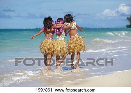 Back View Of Three Young Girls On Beach, Grass Skirts, Lei, Arms Around Each Other, Run In Water View Large Photo Image Stock Image - Back View Of Three Young Girls On Beach, Grass Skirts, Lei, Arms Around Each Other, Run In Water. Fotosearch