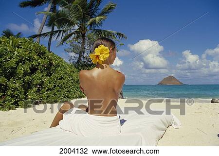 Back View Of Topless Woman On Beach, Hibiscus In Hair, Tropical Massage View Large Photo Image Stock Image - Back View Of Topless Woman On Beach, Hibiscus In Hair, Tropical Massage. Fotosearch