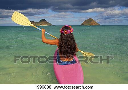 Back View Of Woman In Kayak, Yellow Paddles, Pink Lei, Clear Water, Blue Sky View Large Photo Image Stock Photo - Back View Of Woman In Kayak, Yellow Paddles, Pink Lei, Clear Water, Blue Sky. Fotosearch