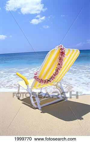 Back View Of Yellow Beach Chair In Sand, Gentle Shore Waters, Pink Lei C1724 View Large Photo Image Stock Image - Back View Of Yellow Beach Chair In Sand, Gentle Shore Waters, Pink Lei C1724. Fotosearch