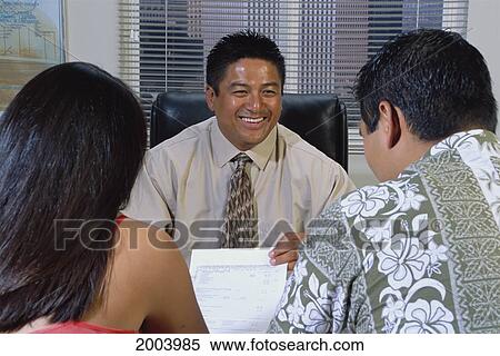 Back View Of Young Local Couple Meet With Smiling Bank Loan Officer, Office Setting View Large Photo Image Stock Photography - Back View Of Young Local Couple Meet With Smiling Bank Loan Officer, Office Setting. Fotosearch