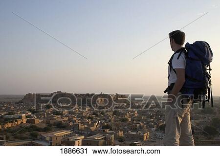 Backpacker Looking Over Jaisalmere View Large Photo Image Stock Image - Backpacker Looking Over Jaisalmere. Fotosearch