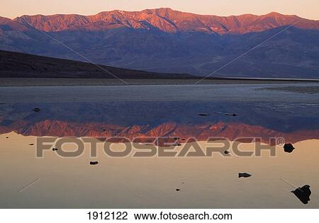 Stock Image - Badwater And Panamint Mountains, Death Valley, California, Usa.. Fotosearch