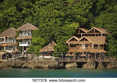 Stock Photo - Balabag, Aklan, Philippines; Houses Along The Coast Of Boracay Island. Fotosearch
