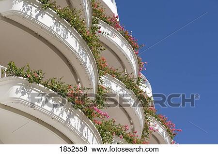 Stock Photo - Balconies Covered With Flowers; Maui, Hawaii, Usa. Fotosearch
