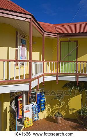 Stock Photograph - Balcony And Shops On Front Street; Philipsburg, St. Maarten Island, Netherlands Antilles. Fotosearch