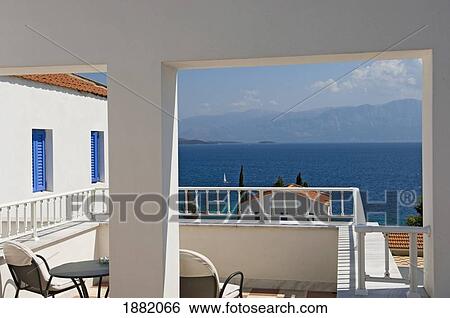 Stock Photograph - Balcony In Resort Overlooking Some Of The Ionian Islands.. Fotosearch
