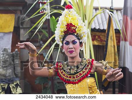 Stock Photo - Balinese dancer using codified hand positions and gestures at a Barong dance performance in Batubulan, Bali, Indonesia. Fotosearch