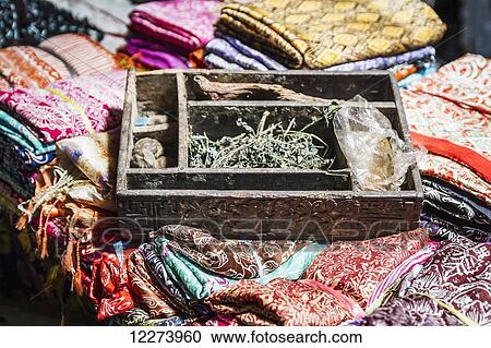 Balinese fabrics for sale in a store, Tenganan Pegringsingan, Bali, Natural dyes and Indonesia View Large Photo Image Stock Image - Balinese fabrics for sale in a store, Tenganan Pegringsingan, Bali, Natural dyes and Indonesia. Fotosearch