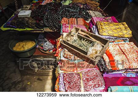 Stock Photo - Balinese fabrics for sale in a store, Tenganan Pegringsingan, Bali, Natural dyes and Indonesia. Fotosearch
