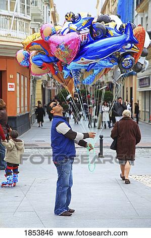 Balloon Vendor, Cadiz, Andalucia, Spain View Large Photo Image Stock Photograph - Balloon Vendor, Cadiz, Andalucia, Spain. Fotosearch