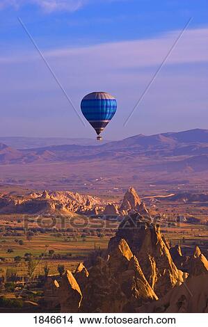Picture - Balloons Over Goreme Valley; Cappadocia, Turkey. Fotosearch
