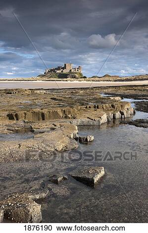 Bamburgh, Northumberland, England; Bamburgh Castle In The Distance View Large Photo Image Stock Image - Bamburgh, Northumberland, England; Bamburgh Castle In The Distance. Fotosearch