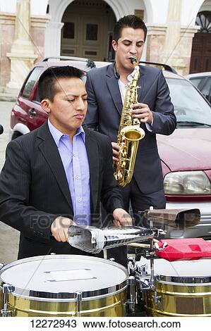 Stock Image - Band performing at the Mirador de Turi, Cuenca, Azuay, Ecuador. Fotosearch